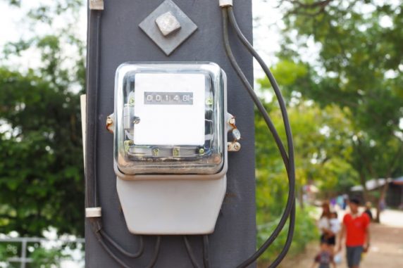 Electric meter front view on bokeh background